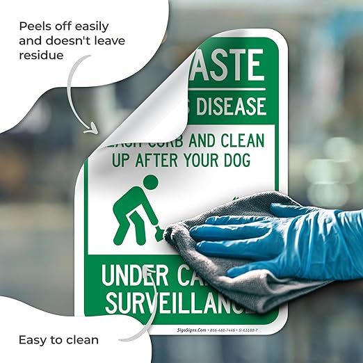 Pet Waste Leash-Curb and Clean Up After Your Dog Under Camera Surveillance Sign, (SI-63188) 10x7 Inches, 4 Mil Vinyl Decal Stickers Weather Resistant, Made in USA