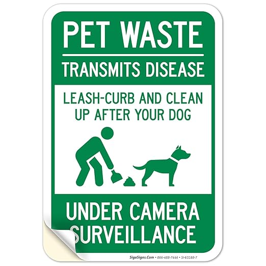 Pet Waste Leash-Curb and Clean Up After Your Dog Under Camera Surveillance Sign, (SI-63188) 10x7 Inches, 4 Mil Vinyl Decal Stickers Weather Resistant, Made in USA