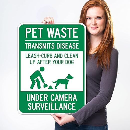 Pet Waste Leash-Curb and Clean Up After Your Dog Under Camera Surveillance Sign, (SI-63188) 18x24 Inches, 55 mil Thick HDPS (high Density polystyrene), Made in USA