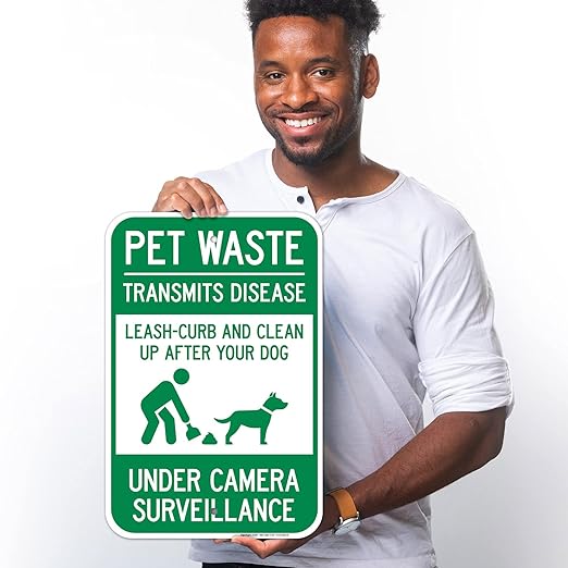 Pet Waste Leash-Curb and Clean Up After Your Dog Under Camera Surveillance Sign, (SI-63188) 12x18 Inches, Rust Free .063 Aluminum, Fade Resistant, Made in USA